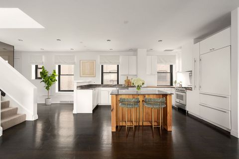 Moderne Küche mit Holzinsel und hochwertiger Ausstattung 1500x1000c.jpeg