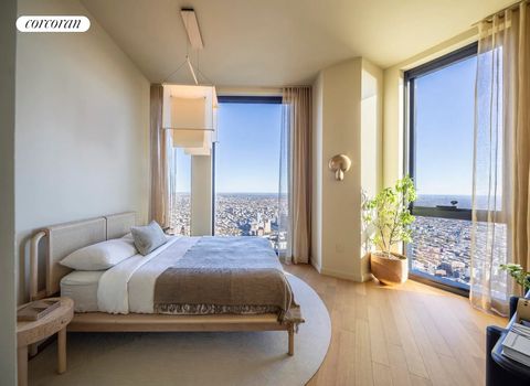 Schlafzimmer mit bodentiefen Fenstern und Blick auf die Skyline bei Tageslicht 157915549.jpeg