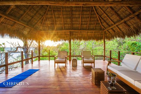 Terrasse mit Strohdach 82d4818b-12d3-4379-b59c-8083aa42bd63.jpg