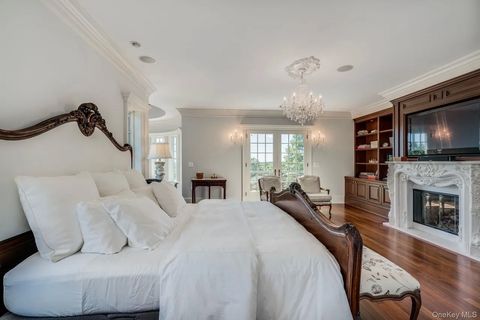 Großes weißes Schlafzimmer mit Holzkamin 85e2c315594c52753ab610f591889bbal-m3266759592rd-w1280_h960.jpeg