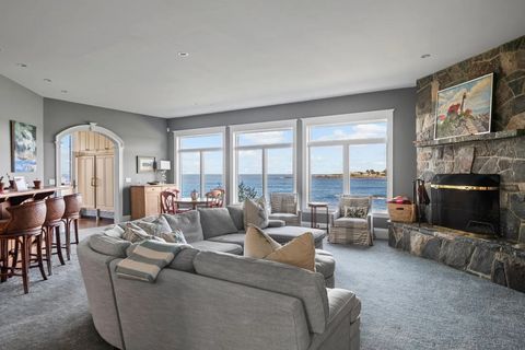 Wohnzimmer mit Bar, Kamin, helle Fensterfront zum Meer imagereader8.jpg