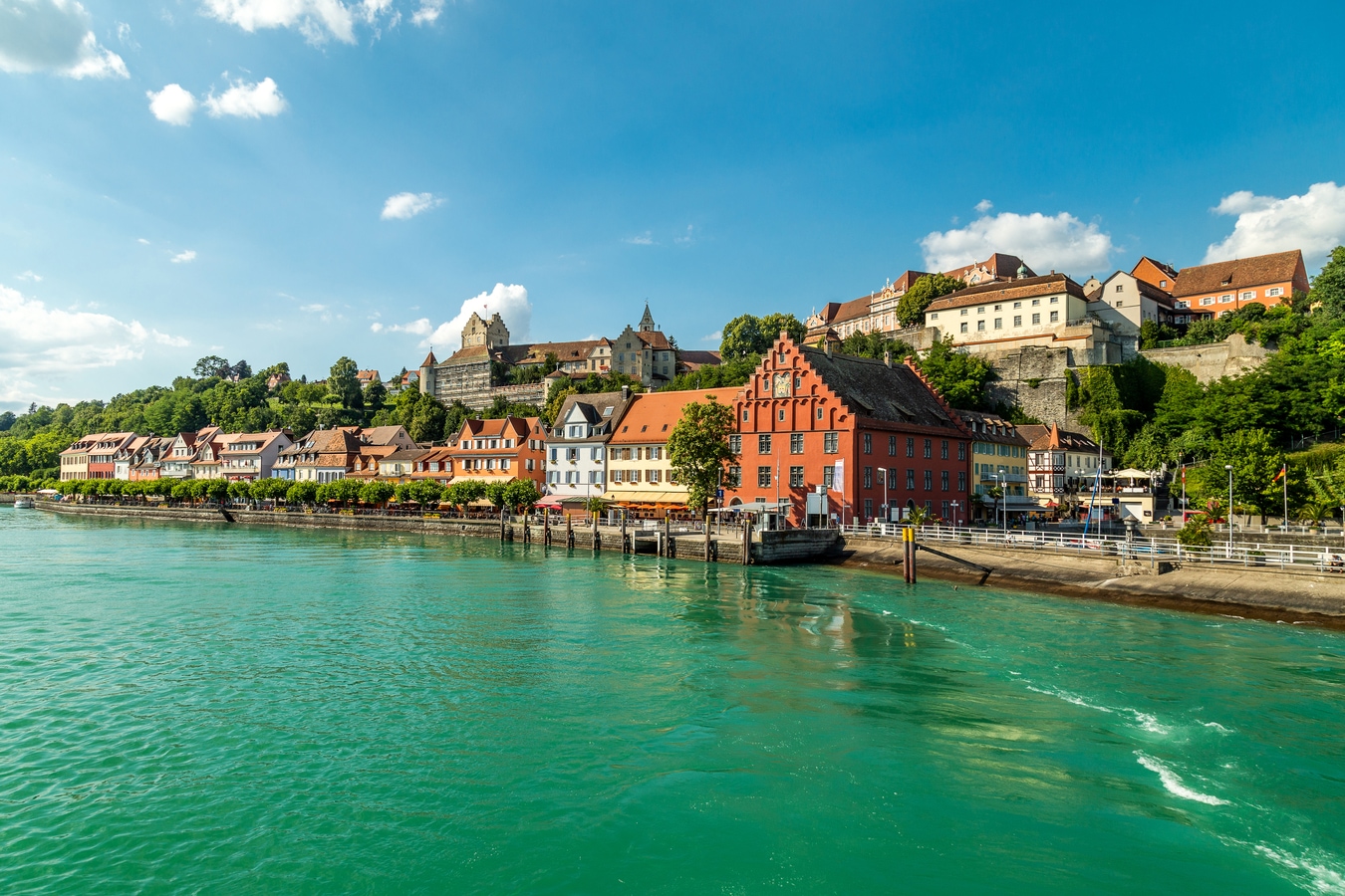 Meersburg, town in the German state of Baden-Wurttemberg on the shore of Lake Constance (Bodensee), famous for a Medieval Meersburg Castle. As seen from a ferry to Konstanz AdobeStock_212181597_hungry_herbivore.jpeg