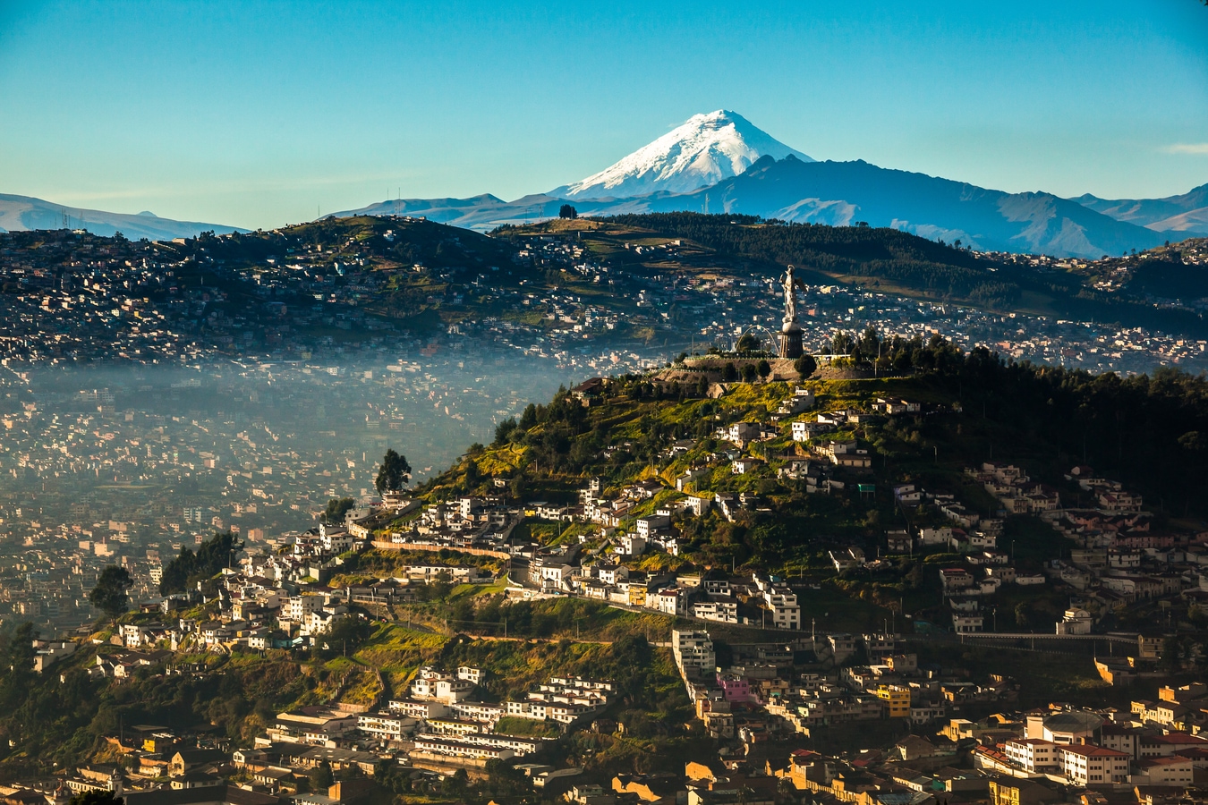 View of El Panecillo in the center of Quito with the Cotopaxi in the background AdobeStock_131305531_ecuadorquerido.jpeg