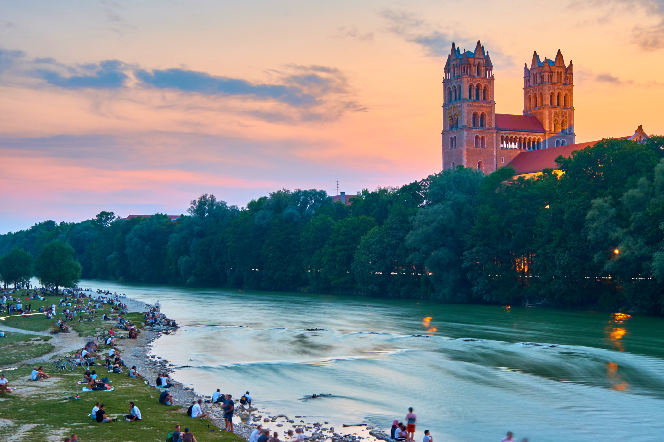 Sunset Over the Isar in Central Munich AdobeStock_373496081_Andreas_quer.jpeg