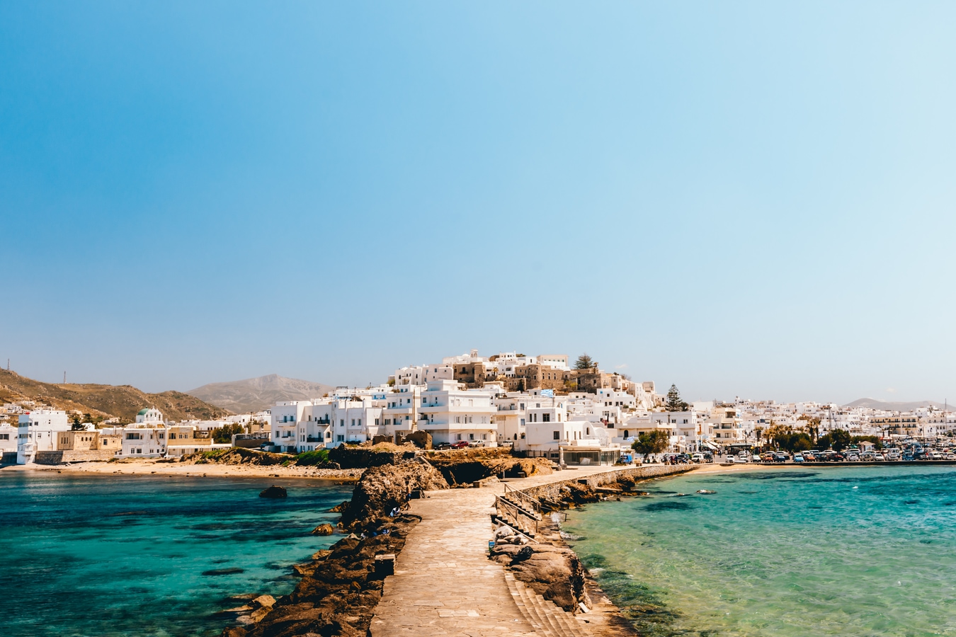 Cityscape of Naxos town on a sunny day, Naxos, Greece AdobeStock_269274328_dominikfrings.jpeg
