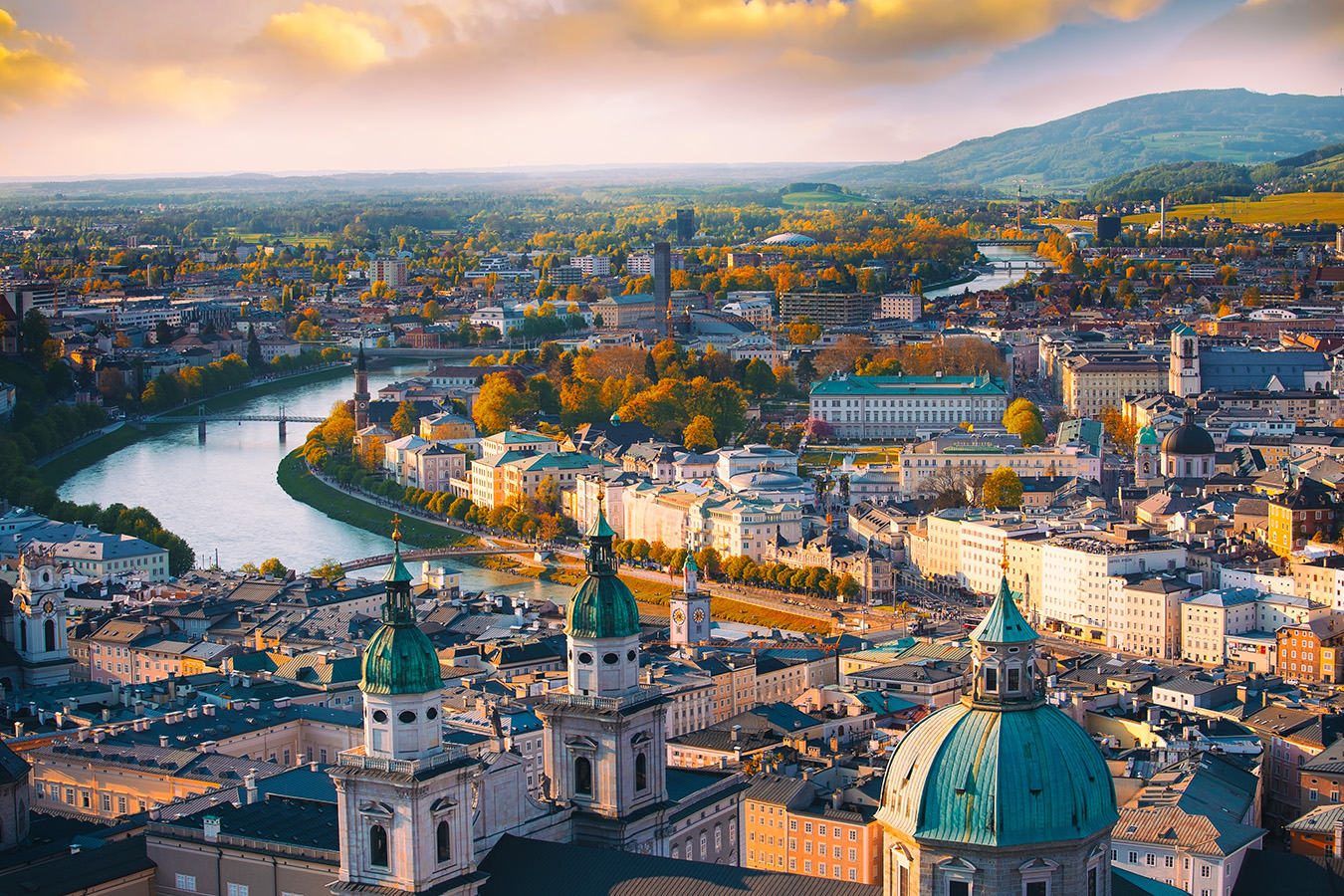 Beautiful of Aerial panoramic view in a Autumn season at a historic city of Salzburg with Salzach river in beautiful golden evening light sky and colorful of autumn at sunset, Salzburger Land, Austria 1350x900_Website_AdobeStock_278470364_SASITHORN.jpg